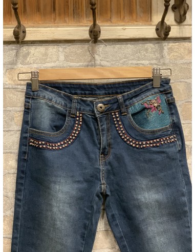 Pantalón vaquero detalle en bolsillo