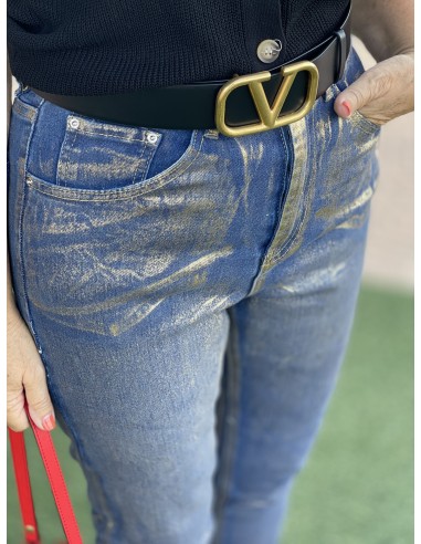 Pantalón vaquero efecto metalizado oro