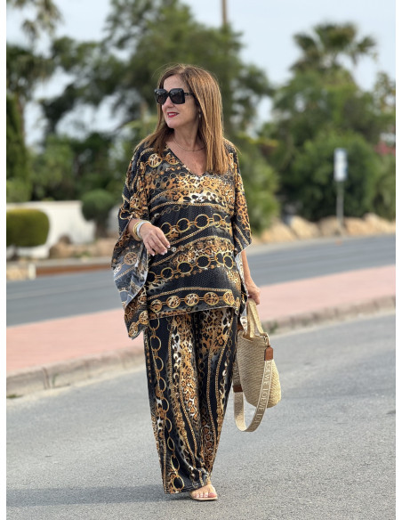 🖤 Blusón Punto Seda Negro con Estampado Animal Print y Cadenas