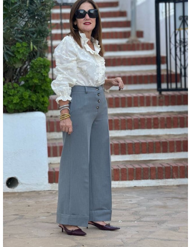 Pantalón gris de talle alto con cierre de...