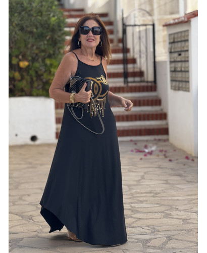 Vestido negro tirante fino con tachas doradas