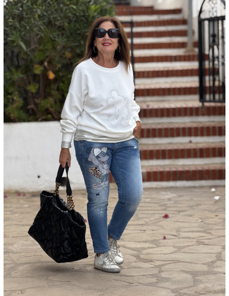 Jeans denim con Mickey en strass y detalle animal print