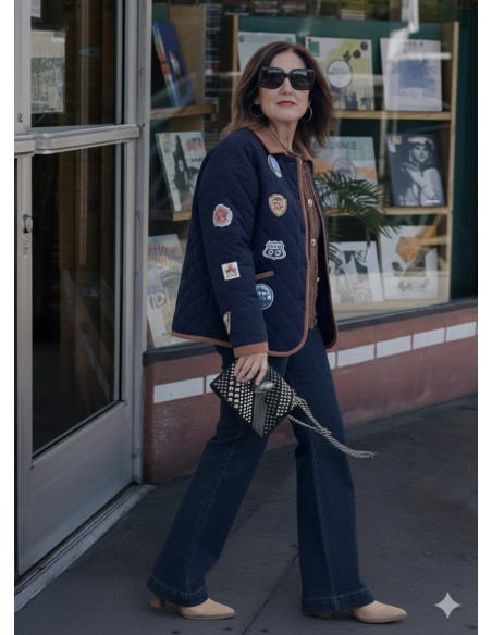 Chaqueta acolchada de micropana azul con parches y forro polar