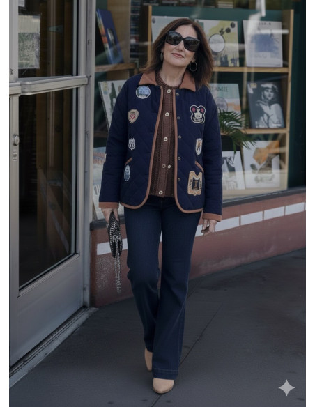 Chaqueta acolchada de micropana azul con parches y forro polar