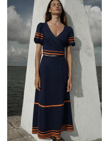 Conjunto de top y falda azul marino con...