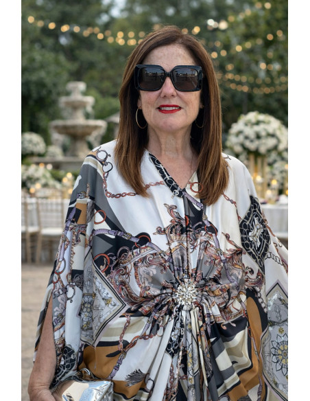 Vestido satén con broche central y estampado