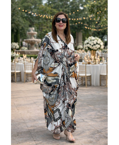 Vestido satén con broche central y estampado