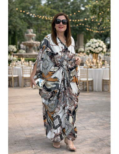 Vestido satén con broche central y estampado