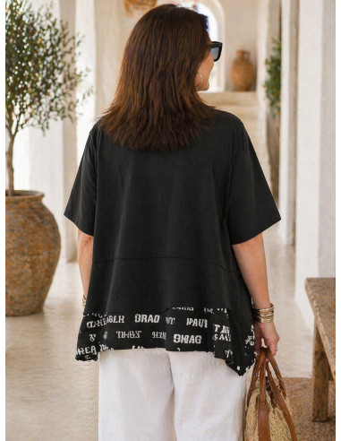 Camiseta negra detalle letras