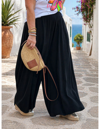 Pantalón negro pata ancha efecto falda