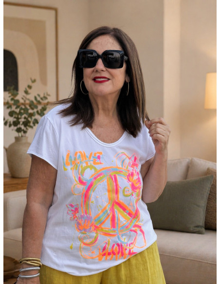 Camiseta blanca símbolo paz flúor
