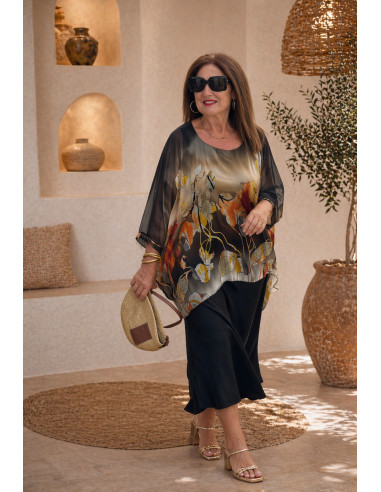 Blusón fluido de seda con estampado.