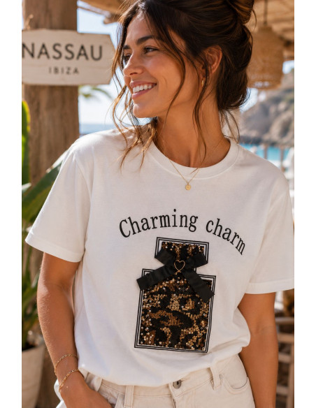 Camiseta blanca perfume con lentejuelas animal print