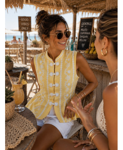 Blusa de lino amarillo con dibujo en blanco