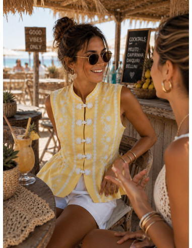 Blusa de lino amarillo con dibujo en blanco