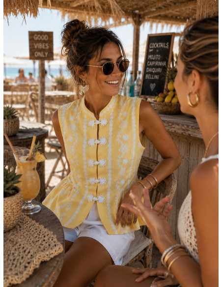 Blusa de lino amarillo con dibujo en blanco