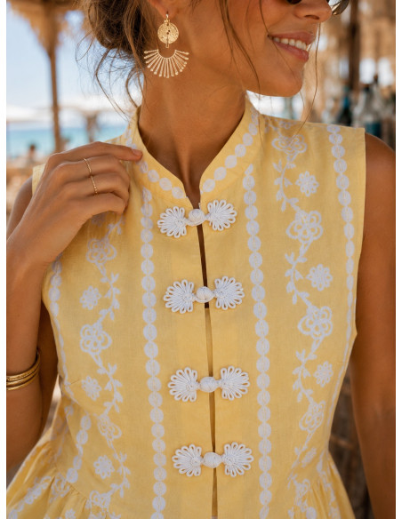 Blusa de lino amarillo con dibujo en blanco