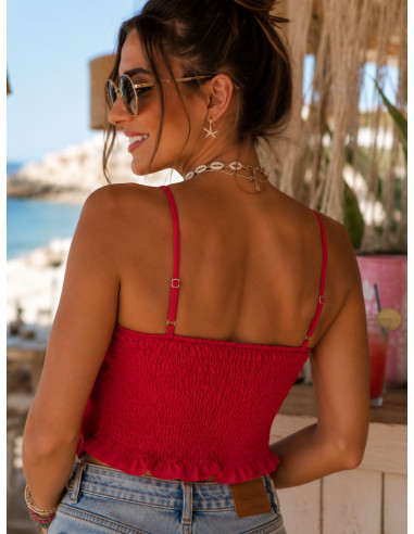 Top rojo con flor frontal espectacular