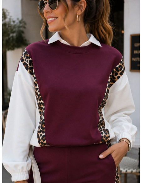 Conjunto granate técnico con detalles animal print