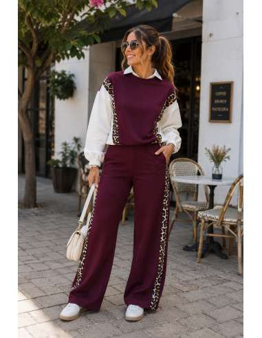Conjunto granate técnico con detalles animal print
