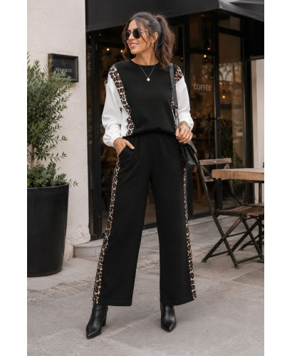 Conjunto negro técnico con detalles animal print