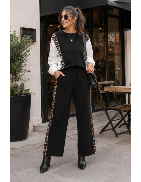 Conjunto negro técnico con detalles animal print