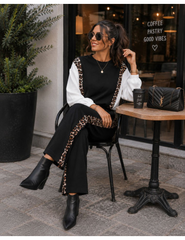 Conjunto negro técnico con detalles animal print