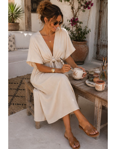 Vestido midi en crudo con lazada frontal y...