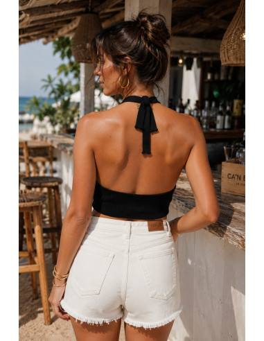 Top halter de punto negro con botones y espalda...