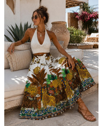 Falda tropical cruda con soles, lunas y palmeras