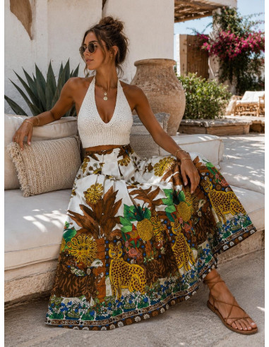 Falda tropical cruda con soles, lunas y palmeras