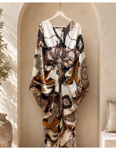 Vestido satén con broche central y estampado