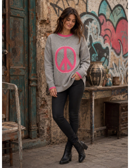 Suéter gris con símbolo de la paz en rosa