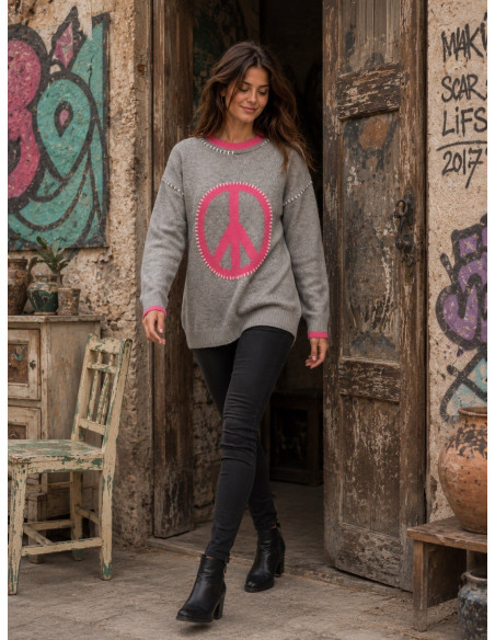 Suéter gris con símbolo de la paz en rosa