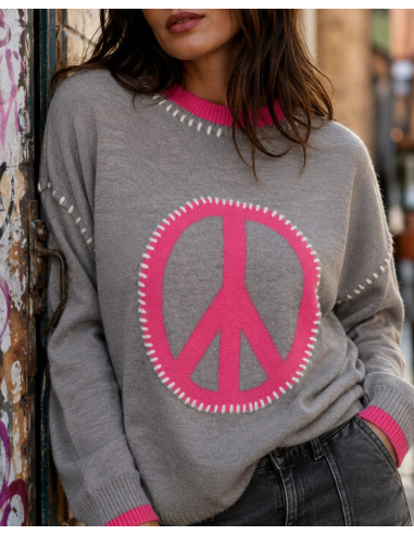 Suéter gris con símbolo de la paz en rosa