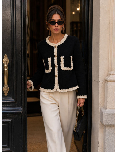 Chaqueta de punto negra con detalles de...